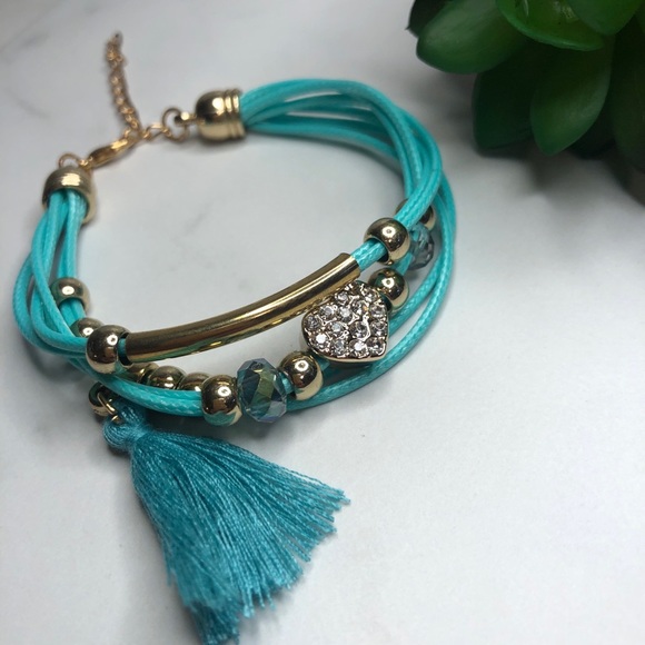 Beautiful teal banded bracelet with jeweled heart - Picture 3 of 11